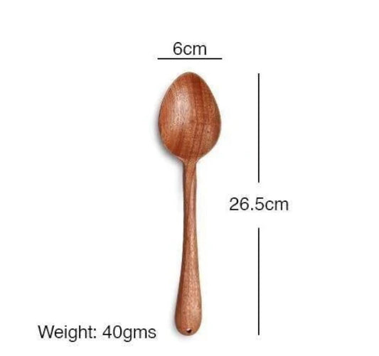 Wooden spoon with measurements on a white background