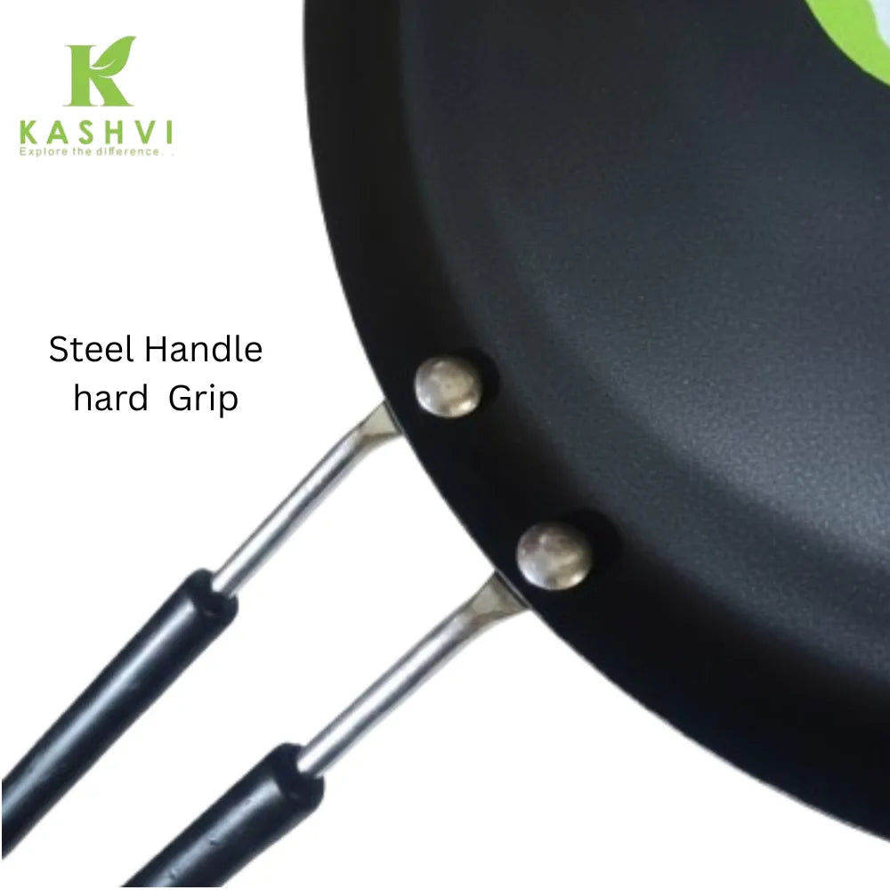 Black frying pan with a steel handle labeled 'Kashvi' on a white background.