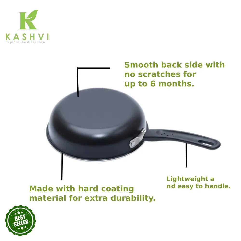 Black frying pan with features highlighted on a white background, branded as Kashvi.