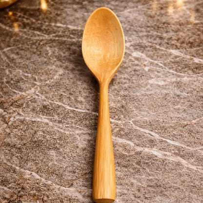 Wooden spoon on a marble surface