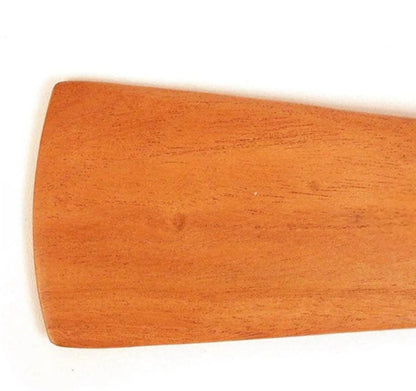 Close-up of a wooden object with a white background